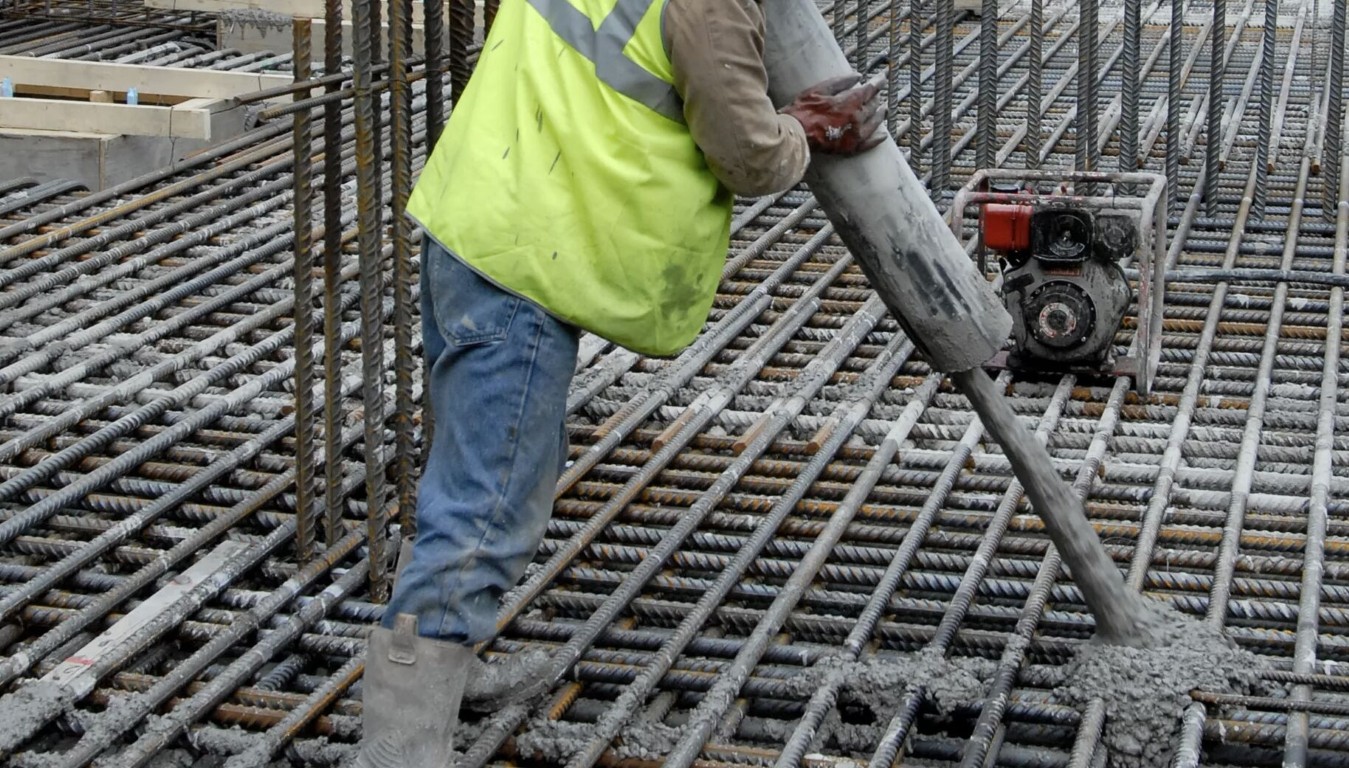 Professional concrete contractor pouring reinforced concrete foundation in Mesquite, NV